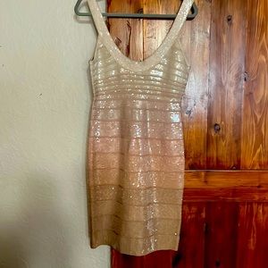 This Herve Leger sleeveless knee length dress and is gorgeous on!